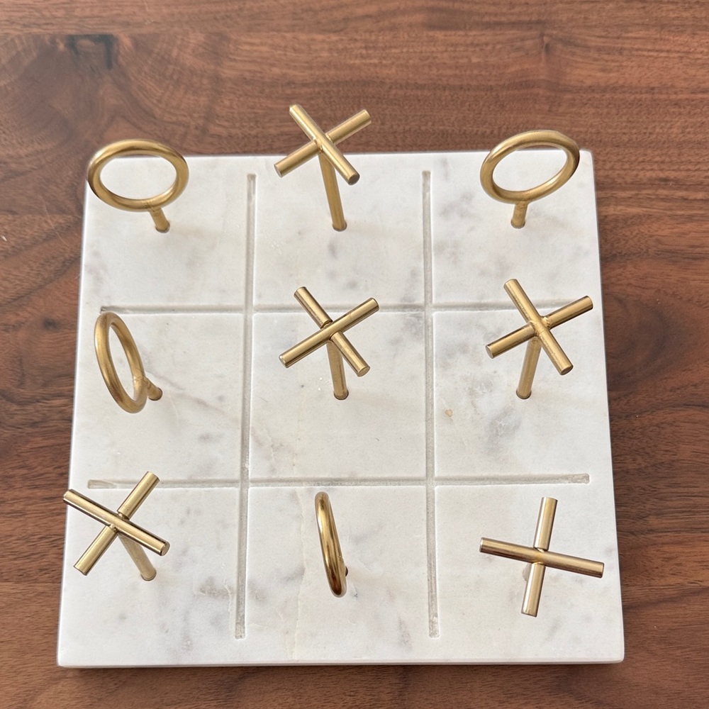Gold Tic Tac Toe Set on Marble Board